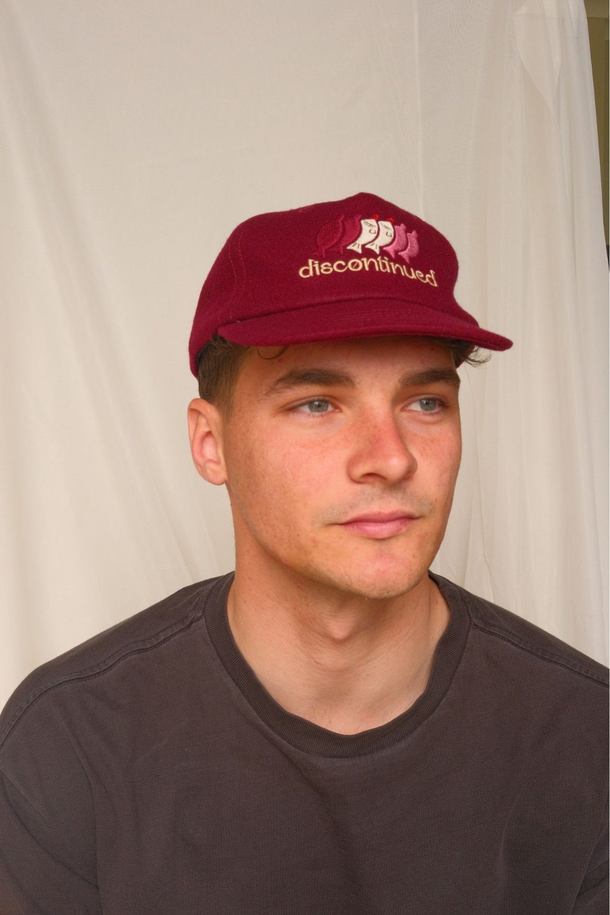 discontinued cap — red